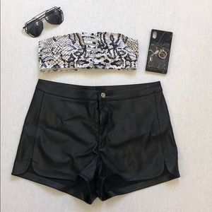 Black faux leather high waisted shorts. 12. NEW